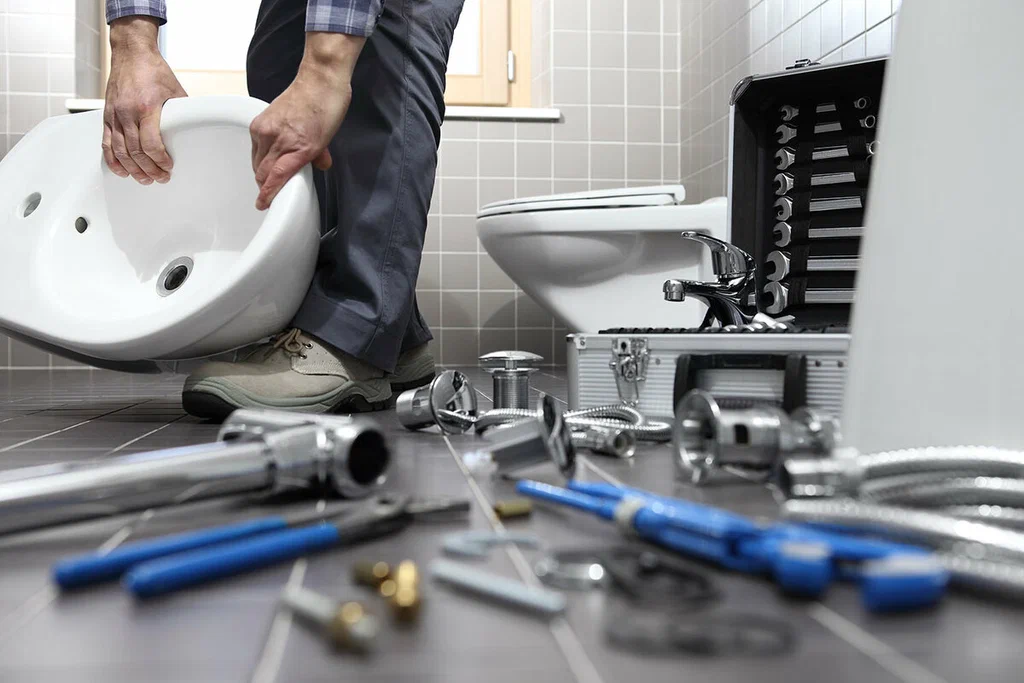 Plumbing tools prepared for a bathroom repair in Upland